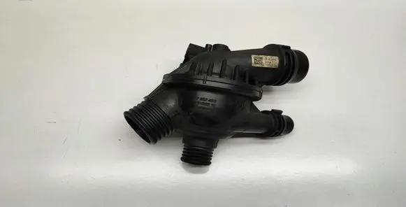 Thermostat/thermostat housing
