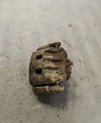 Subaru Forester SF Front brake caliper