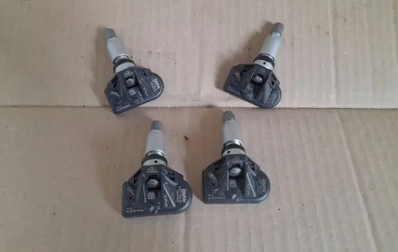 BMW X1 U11 Tire pressure sensor 6877936-04