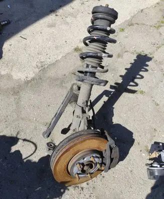 Opel Zafira C Front shock absorber with coil spring 13419916