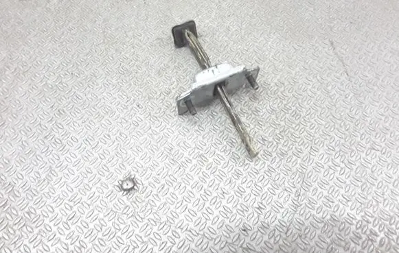 Mazda Demio Rear door check strap stopper