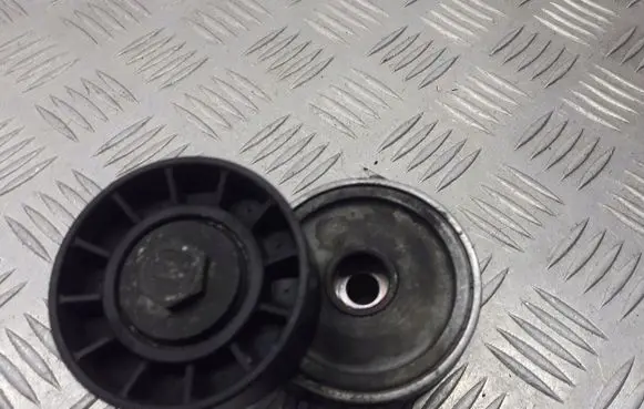 Opel Zafira B Alternator belt tensioner pulley 