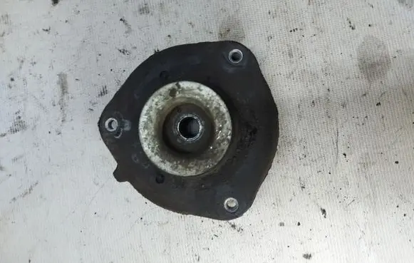 Volkswagen Touran I Coil spring mount 1K0412331