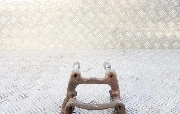 Volkswagen PASSAT B6 Brake caliper pad carrier rear 