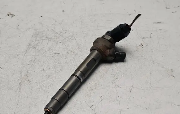 Volkswagen PASSAT B7 Fuel injector 03L130277J