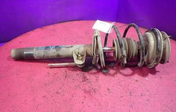 BMW X3 E83 Front shock absorber with coil spring 