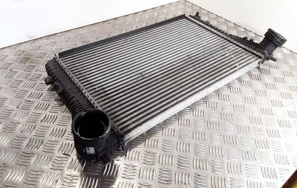 Volkswagen Touran I Intercooler radiator 1K0145803A
