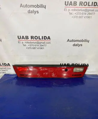 Trunk door license plate light bar