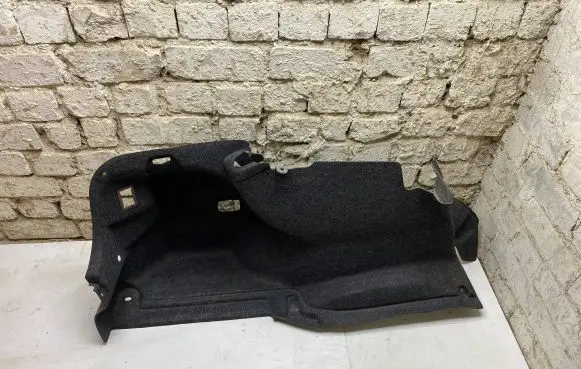 Trunk/boot lower side trim panel