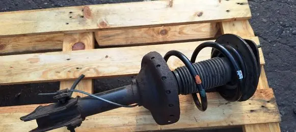 Subaru Outback Front shock absorber with coil spring