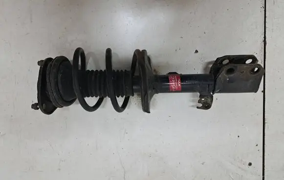 Toyota Avensis T250 Front shock absorber with coil spring 