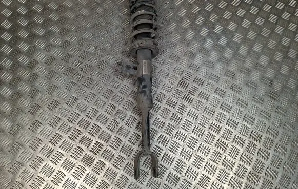 Front shock absorber with coil spring