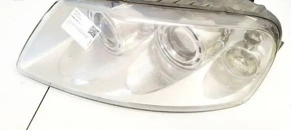Volkswagen Touareg I Headlight/headlamp 89307851