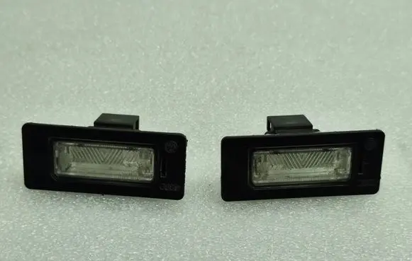 Volkswagen PASSAT B6 Number plate light 8T0943021