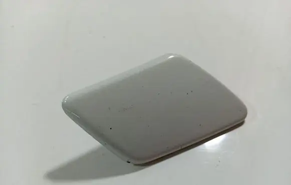 Headlight washer spray nozzle cap/cover