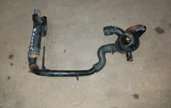 Skoda Superb B6 (3T) Engine coolant pipe/hose 03L121157AL