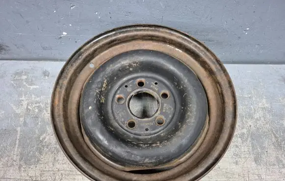 Mercedes-Benz COMPAKT W115 R14 spare wheel 1154001302