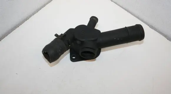 Volkswagen Golf IV Engine coolant pipe/hose 06A121133D