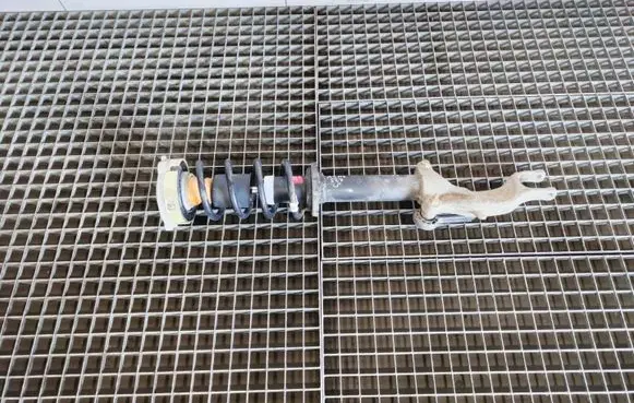 Front shock absorber with coil spring