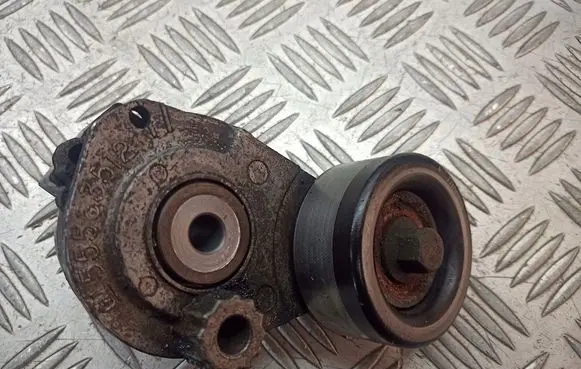 Opel Zafira B Alternator belt tensioner pulley 55563512