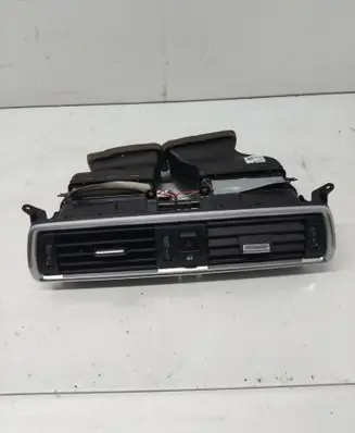 Dash center air vent grill