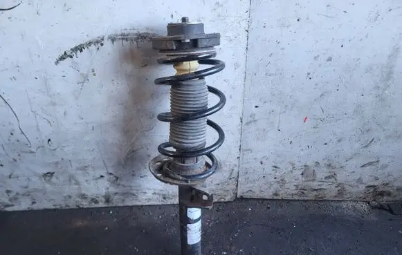 Volkswagen Golf VI Front shock absorber with coil spring