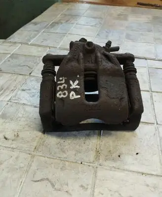 Nissan Note (E11) Front brake caliper
