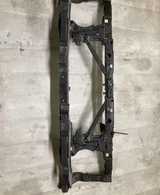 Radiator support slam panel
