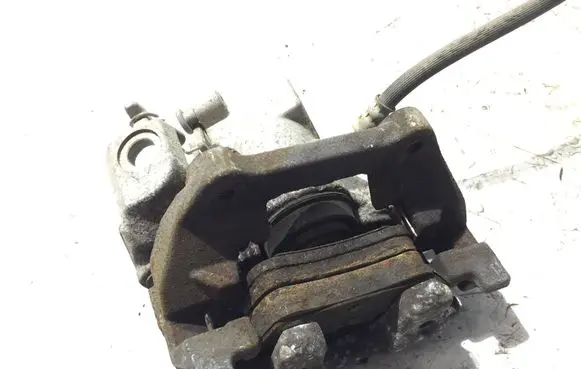 Toyota Yaris Rear brake caliper 991LH
