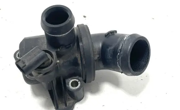 Thermostat/thermostat housing