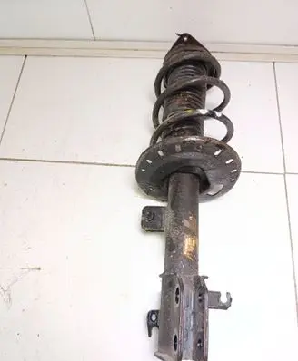 Peugeot 208 Front shock absorber with coil spring 9831168380