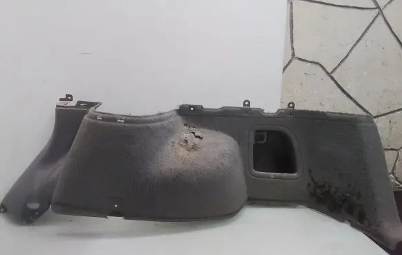 Trunk/boot lower side trim panel