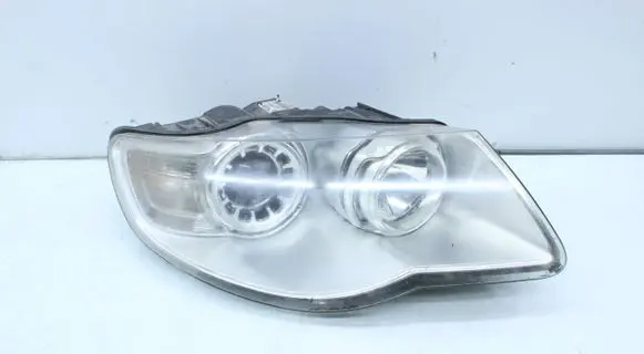 Volkswagen Touareg I Headlight/headlamp 7L6941032