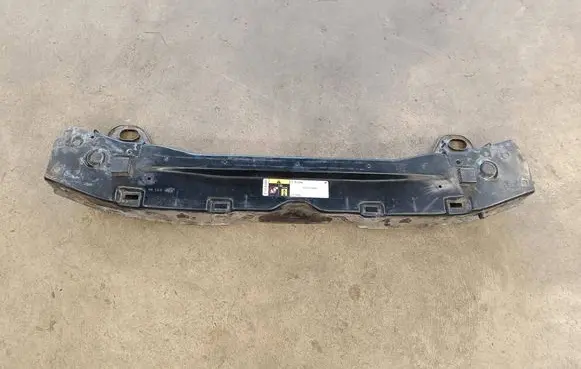 Radiator support slam panel bracket