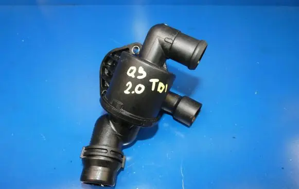 Thermostat/thermostat housing