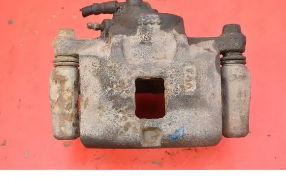 Opel Frontera B Front brake caliper 
