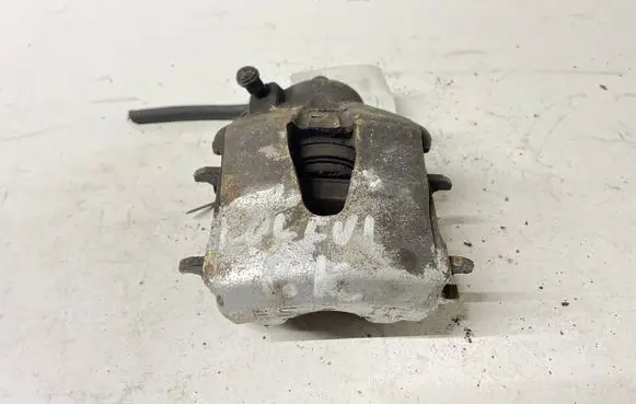 Volkswagen Golf VI Front brake caliper