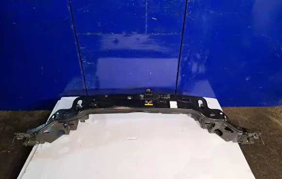 Top upper radiator support slam panel