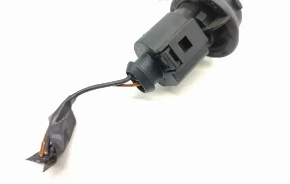 Tail light bulb cover holder