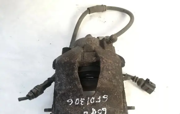 Volkswagen Golf VI Front brake caliper 
