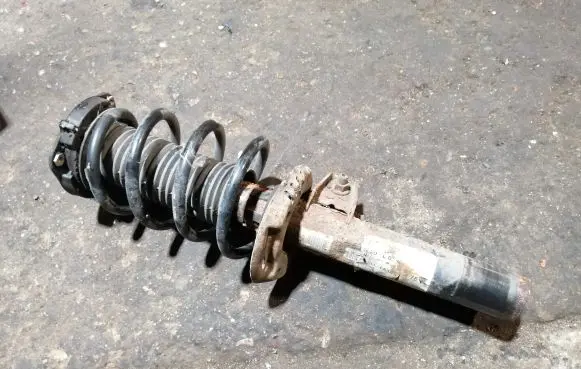 Volkswagen Tiguan Front shock absorber with coil spring 5N0412021