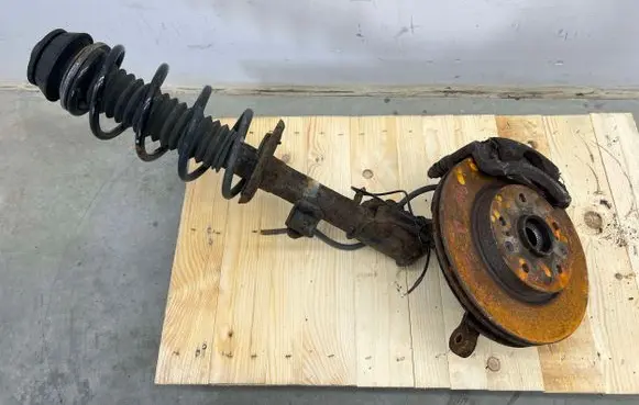 Suzuki SX4 Front shock absorber with coil spring