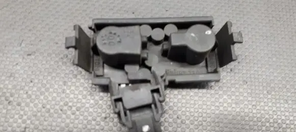 Nissan Primera Tail light bulb cover holder
