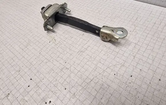 Subaru Outback Front door check strap stopper