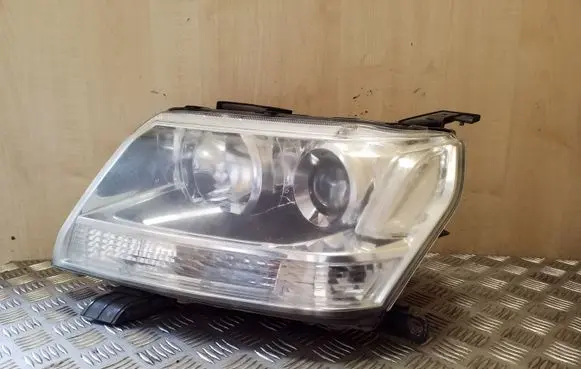 Suzuki Grand Vitara II Headlight/headlamp 10059079 W3T15971