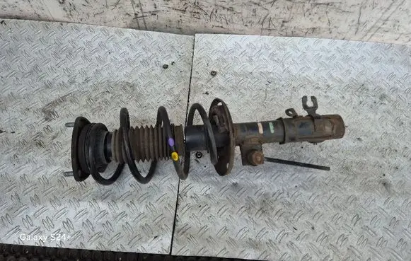 Mazda 3 III Front shock absorber with coil spring