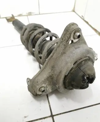 Front shock absorber with coil spring