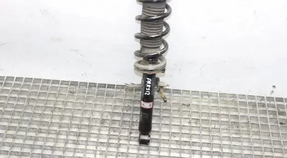 Nissan 370Z Front shock absorber with coil spring 561116GA1A
