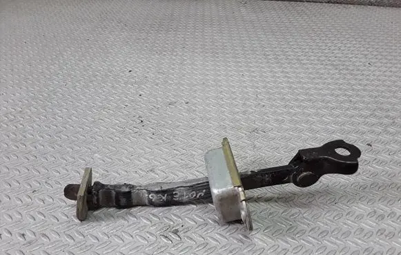 Nissan Note (E11) Rear door check strap stopper