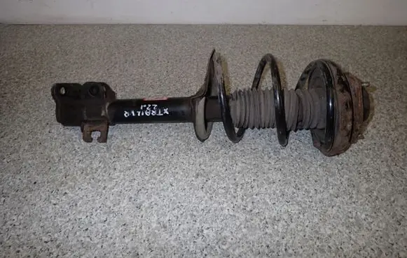Nissan X-Trail T30 Front shock absorber with coil spring
